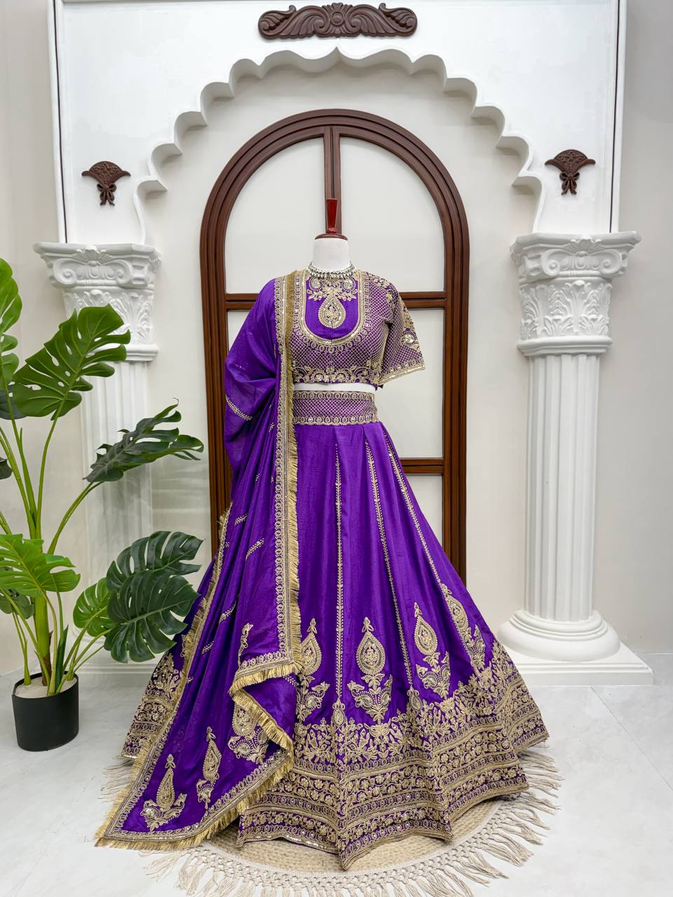 Royal Amethyst Purple Silk Lehenga Choli with Majestic Gold Zari Heritage Motifs and Elaborate Borders